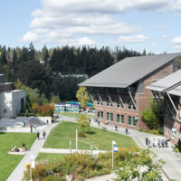 Buildings and field at Cascadia College in Bothell, Washington.